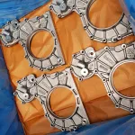 Piezas intercaladas con papel VCI ZERUST y envueltas en película VCI multimetal