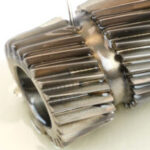 Applying Axxanol 33 Rust Preventative Oil to a Machined Metal Part.