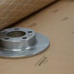 Rotor de freno con rollo de papel de malla VCI Premium que muestra protección
