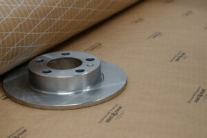 Rotor de freno con rollo de papel de malla VCI Premium que muestra protección
