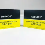 Close-up of two ActivDri CAP-50A Capsules for metal protection applications