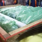 Components packaged in ICT510C-SMM1 film and crated for overseas shipment.